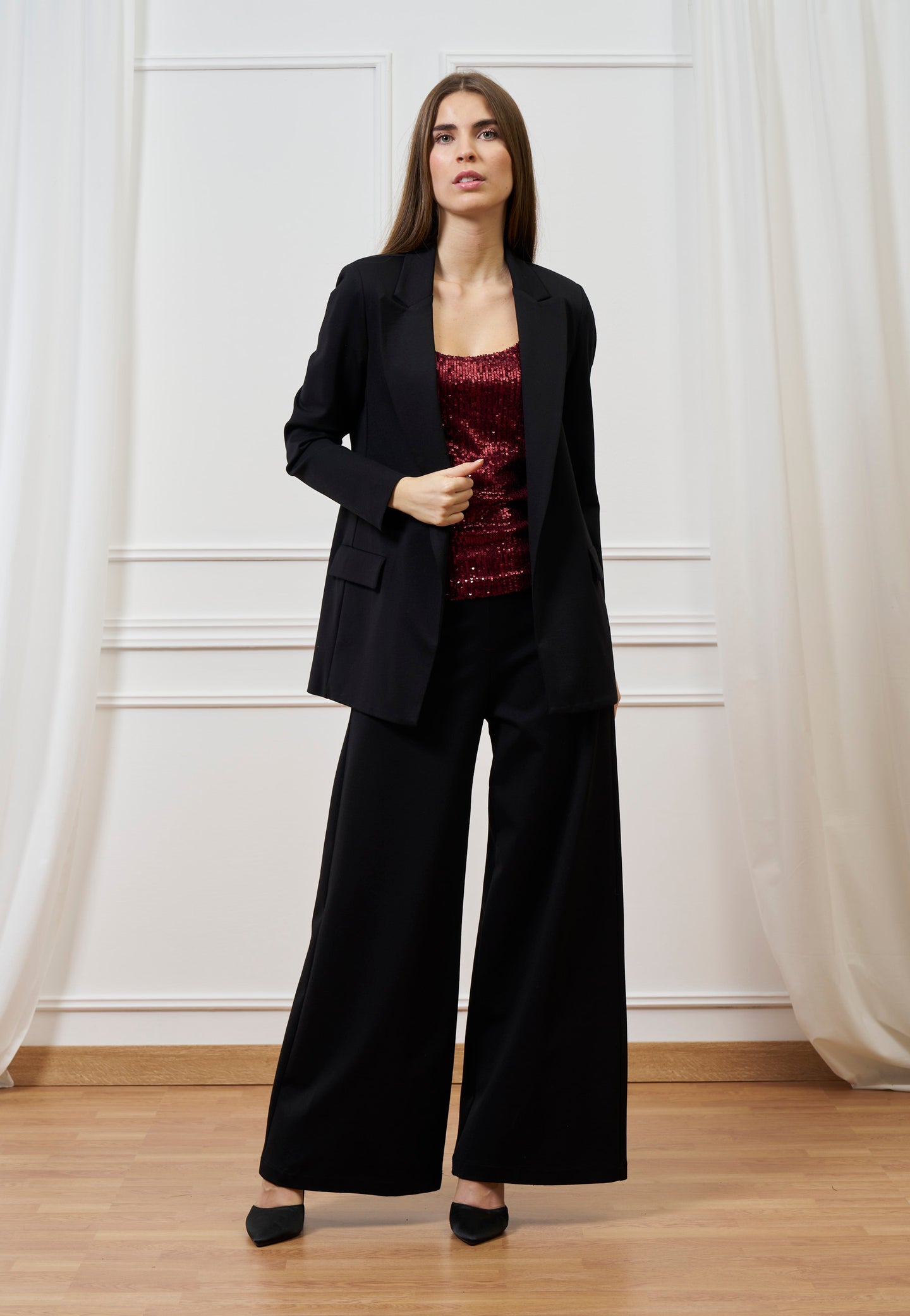 Top paillettes scollo profondo