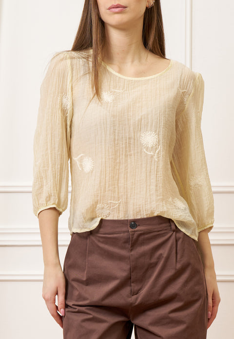 Blusa con fiori piccoli ricamati