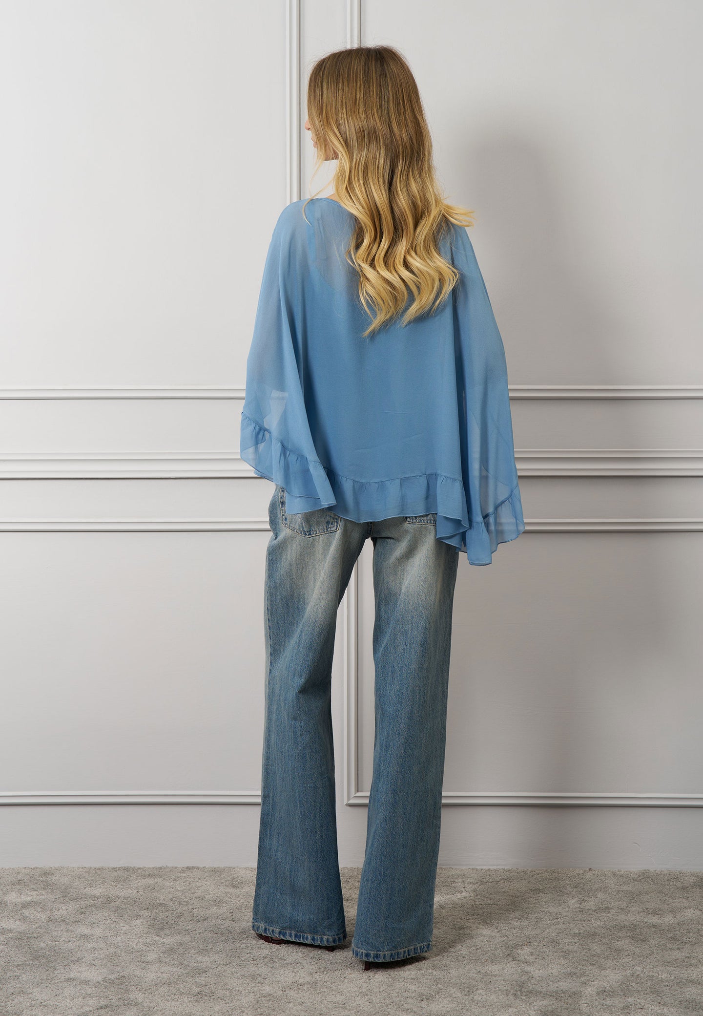 Blusa a mantella con top