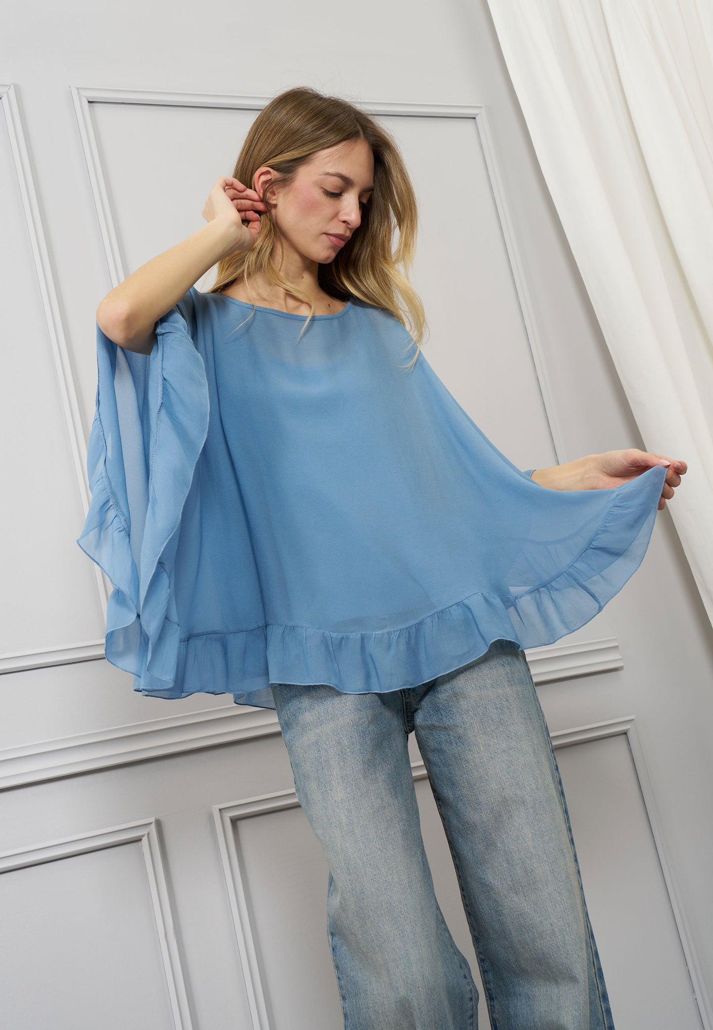Blusa a mantella con top
