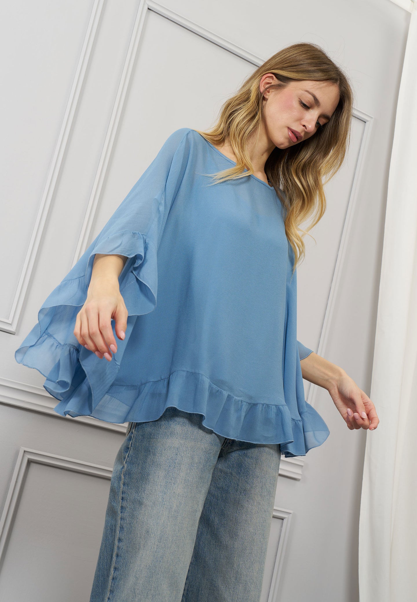 Blusa a mantella con top