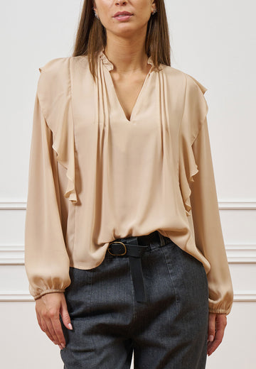 Blusa con scollo a v e volant