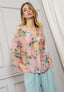 Blusa faldone stampa floreale