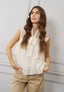 Blusa smanicata con volant