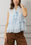 Blusa smanicata con volant