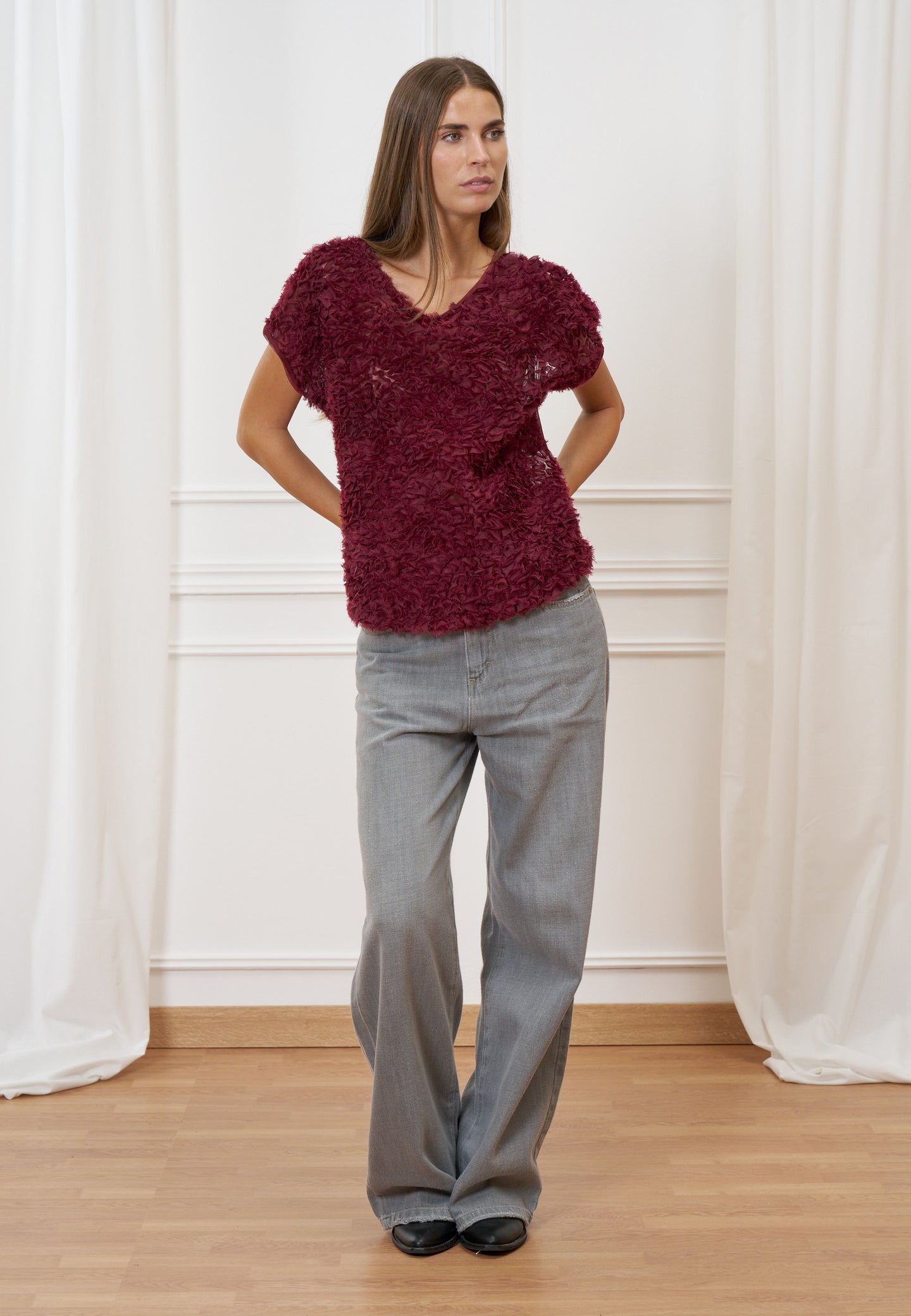 Blusa trasparente con frange