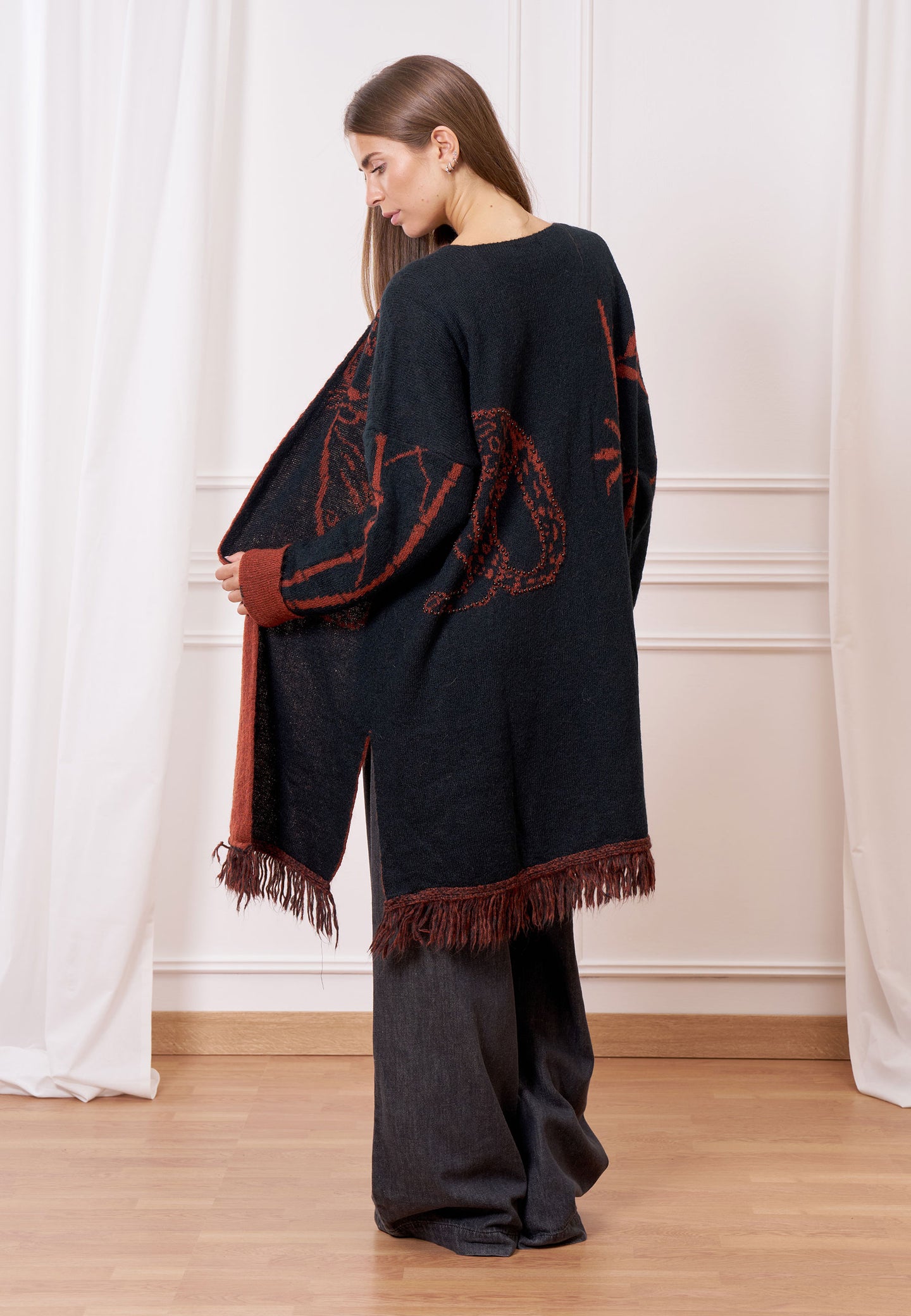 Cappotto maglia jacquard con frange