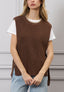 Maglia smanicata con lacci