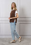 Maglia smanicata con lacci