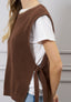 Maglia smanicata con lacci