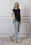 Maglia smanicata con lacci