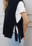Maglia smanicata con lacci