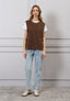 Maglia smanicata con lacci