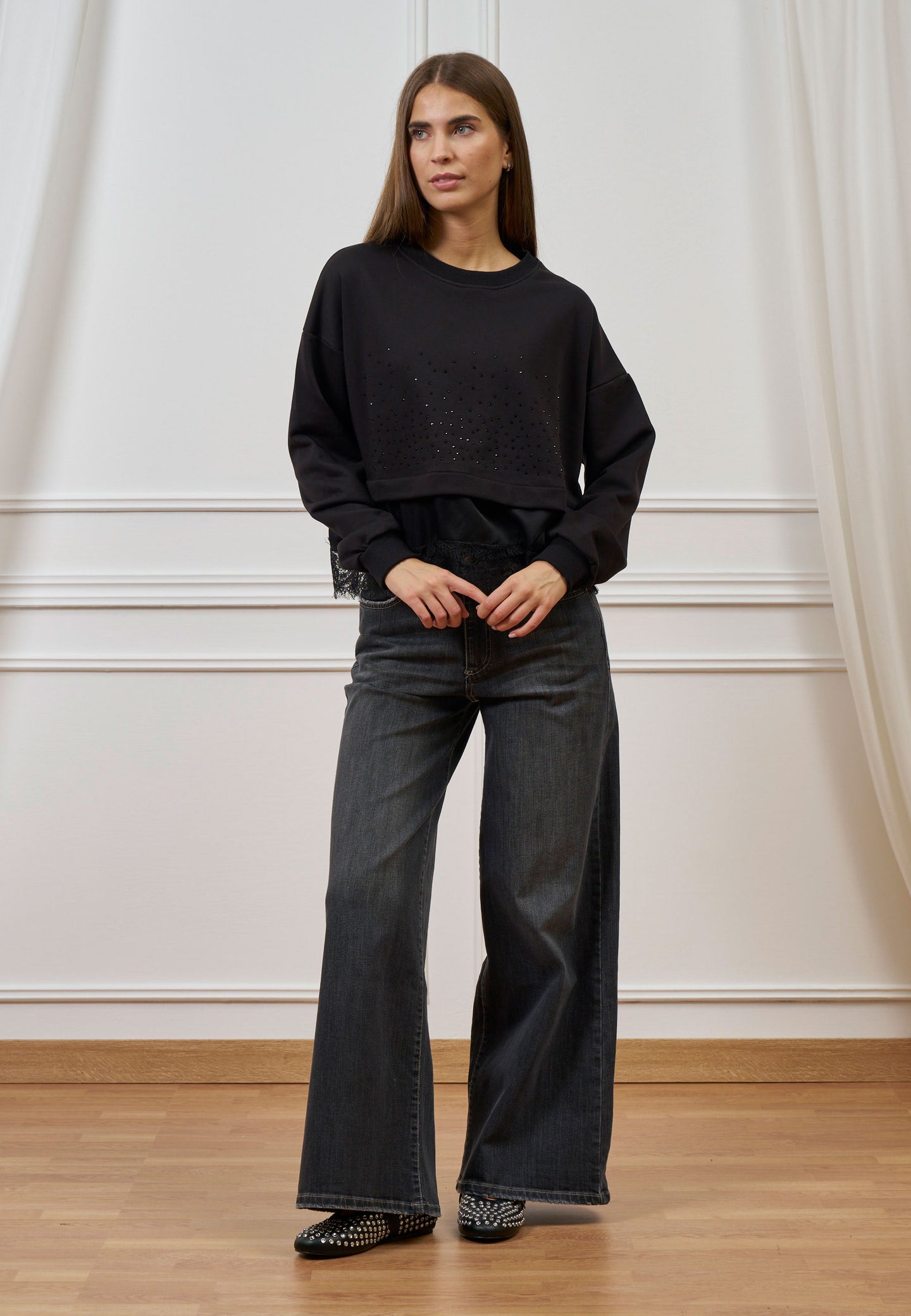 Jeans a vita alta con gamba ampia