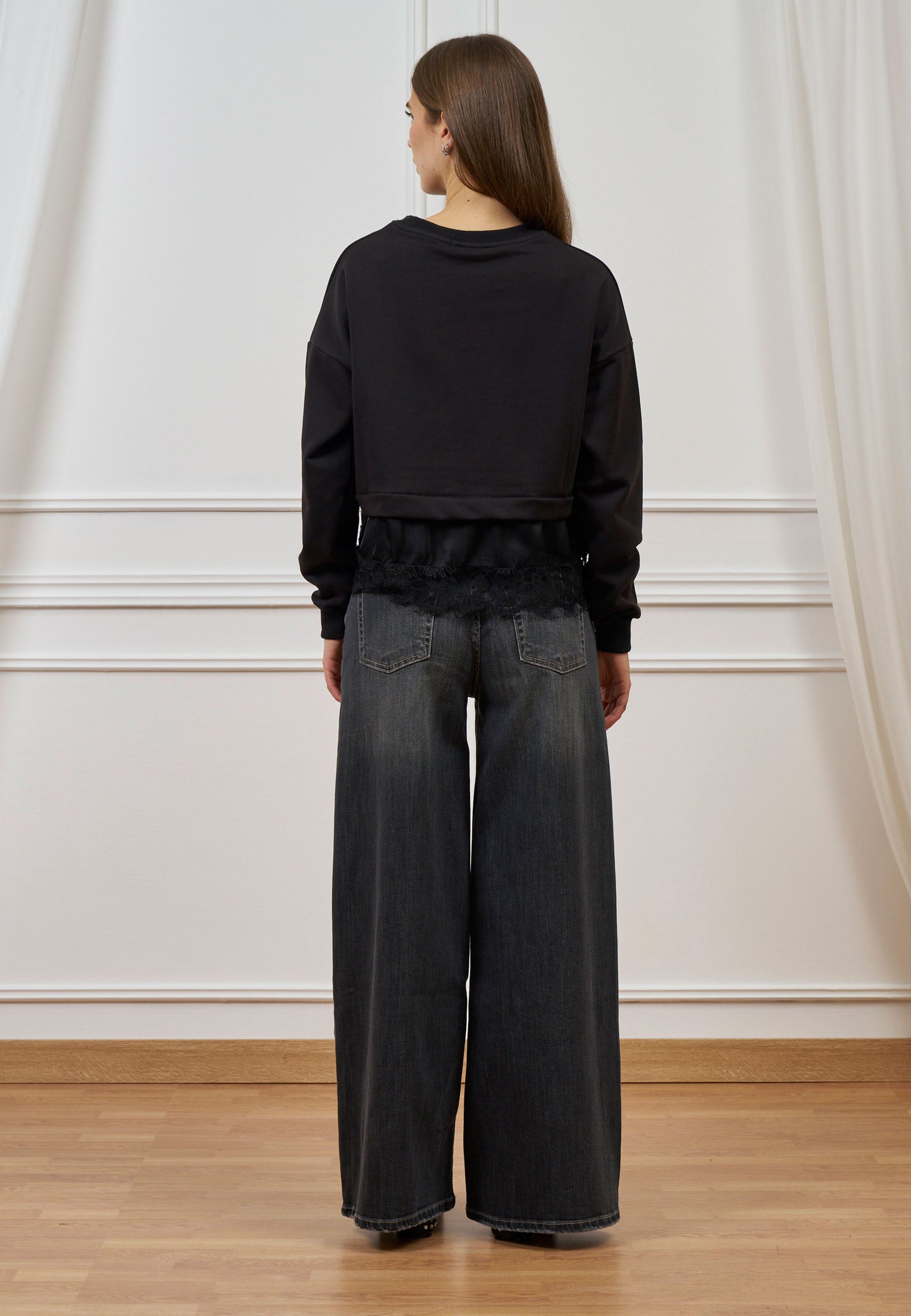 Jeans a vita alta con gamba ampia