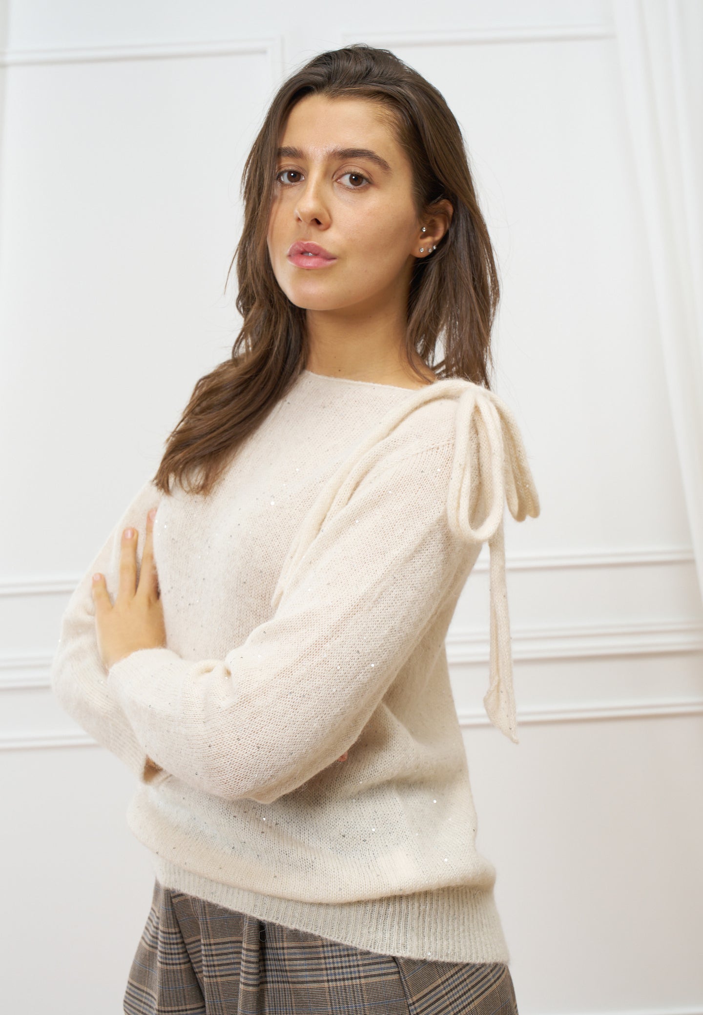 Maglia con fiocco e paillettes