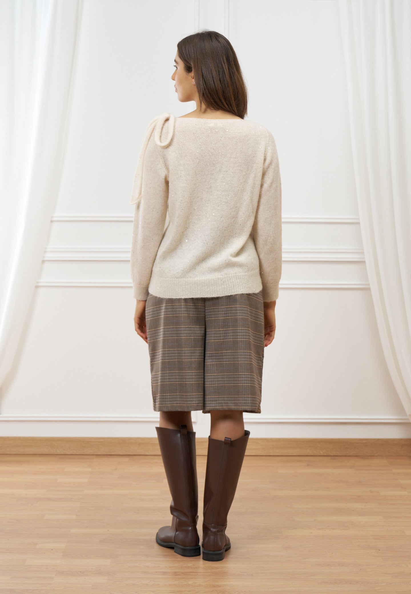 Maglia con fiocco e paillettes