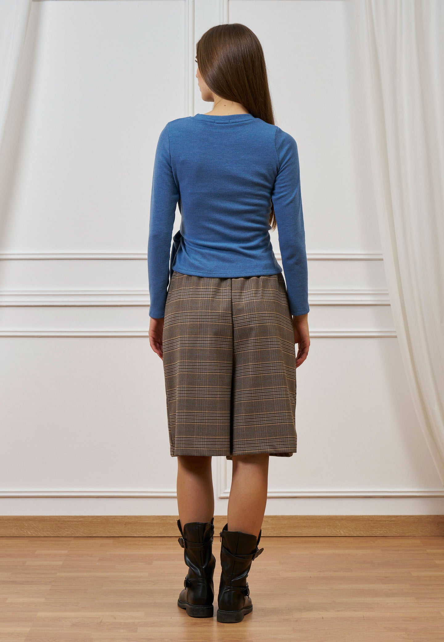 Maglia con nodo in vita