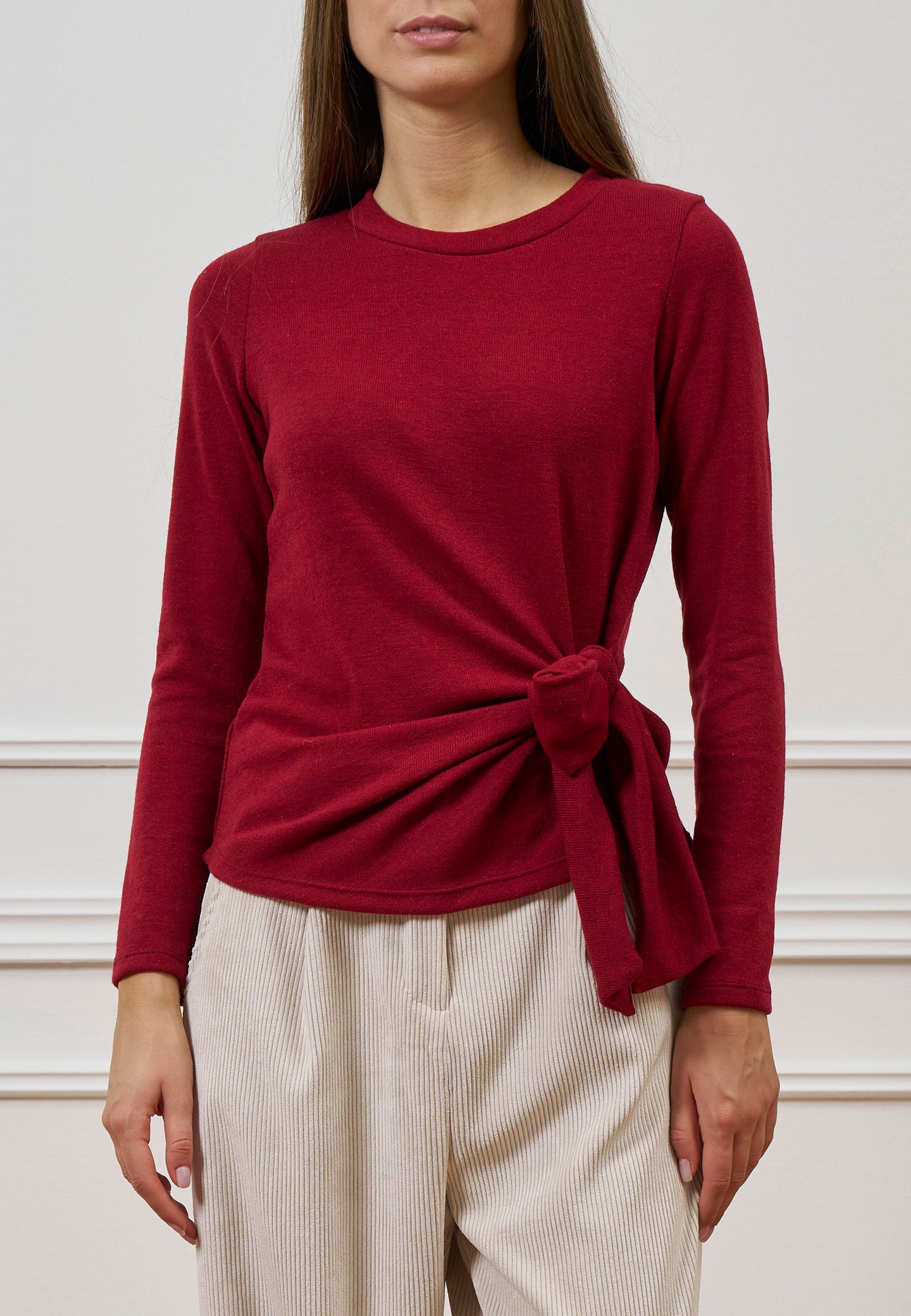 Maglia con nodo in vita