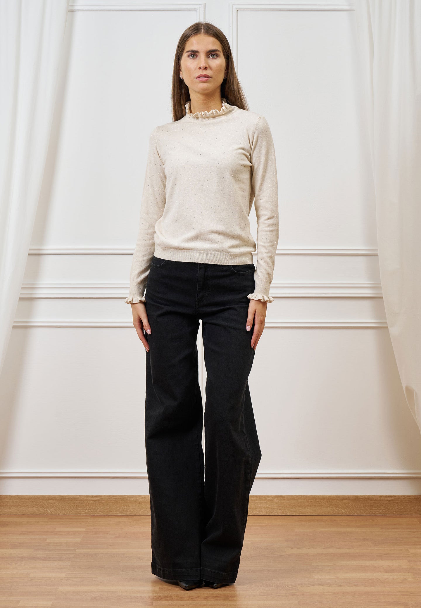 Maglia con rouches e paillettes