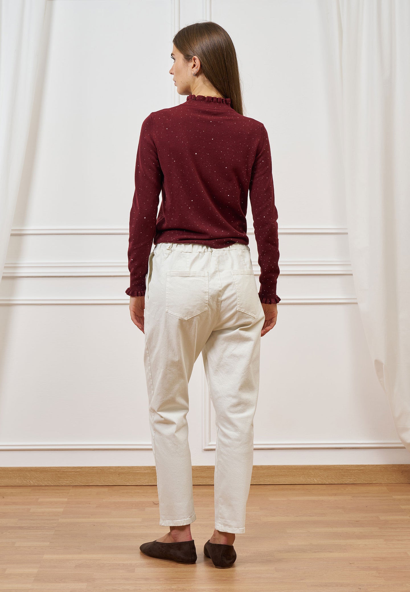 Maglia con rouches e paillettes