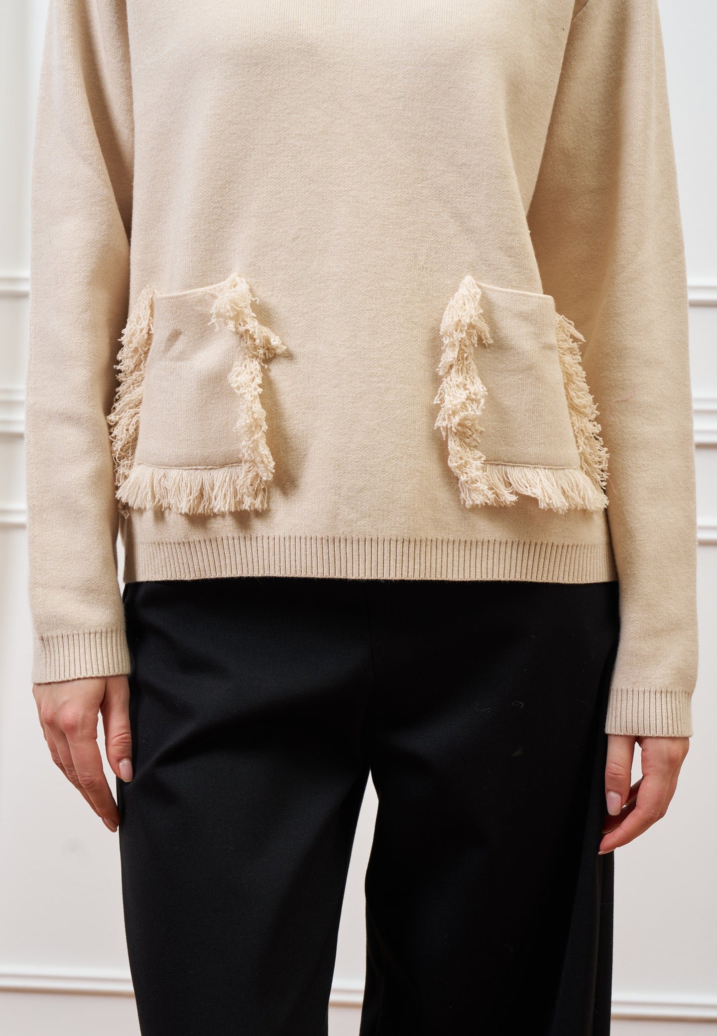Maglia con tasche sfrangiate