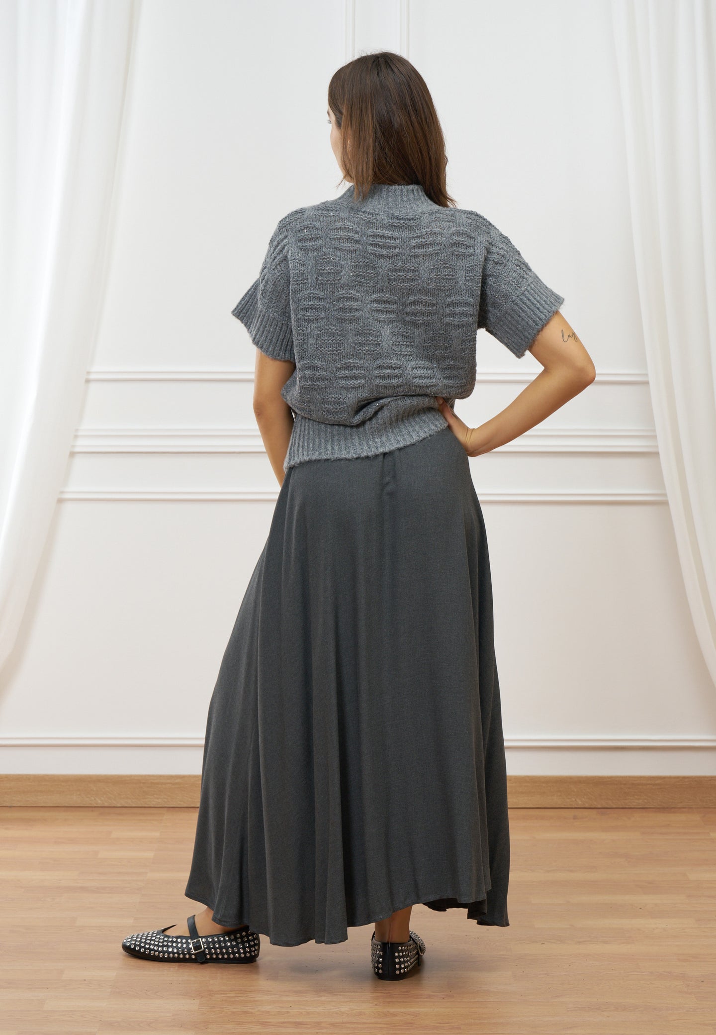 Maglia lavorata smanicata