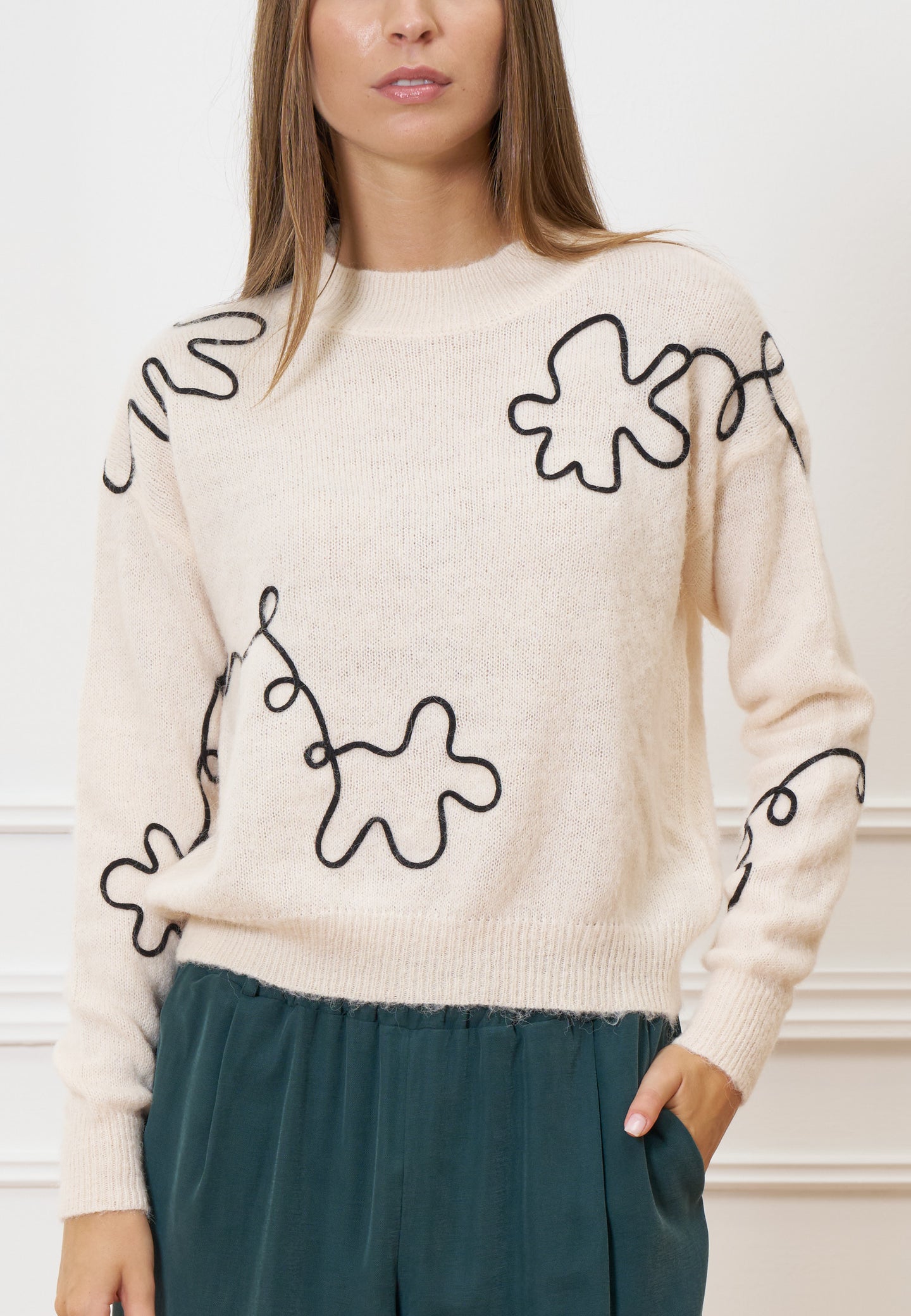 Maglione ricami a contrasto