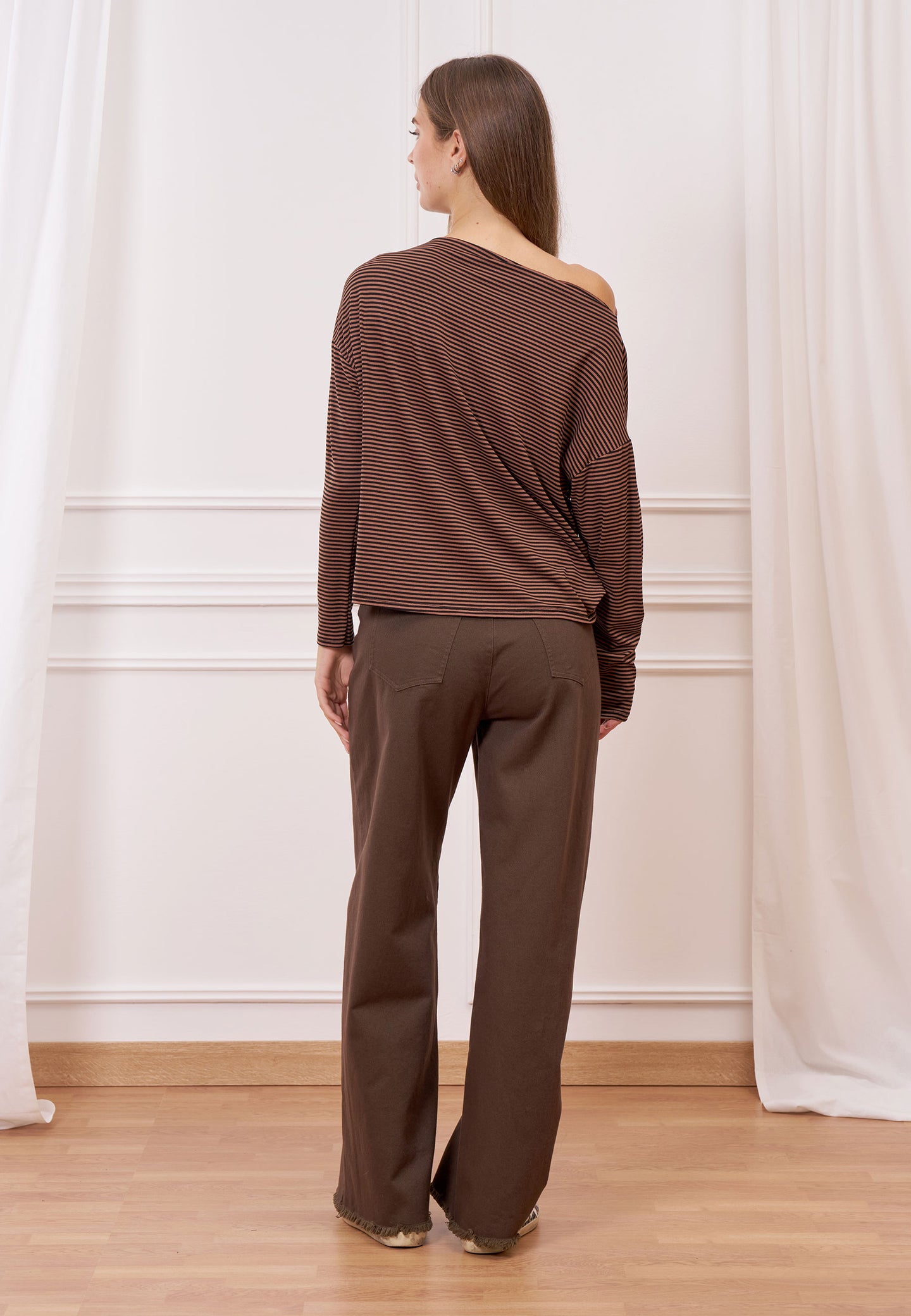 Pantalone palazzo con orlo sfrangiato