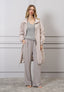 Top smanicato lurex in maglia