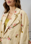 Trench corto con ricamo fiori