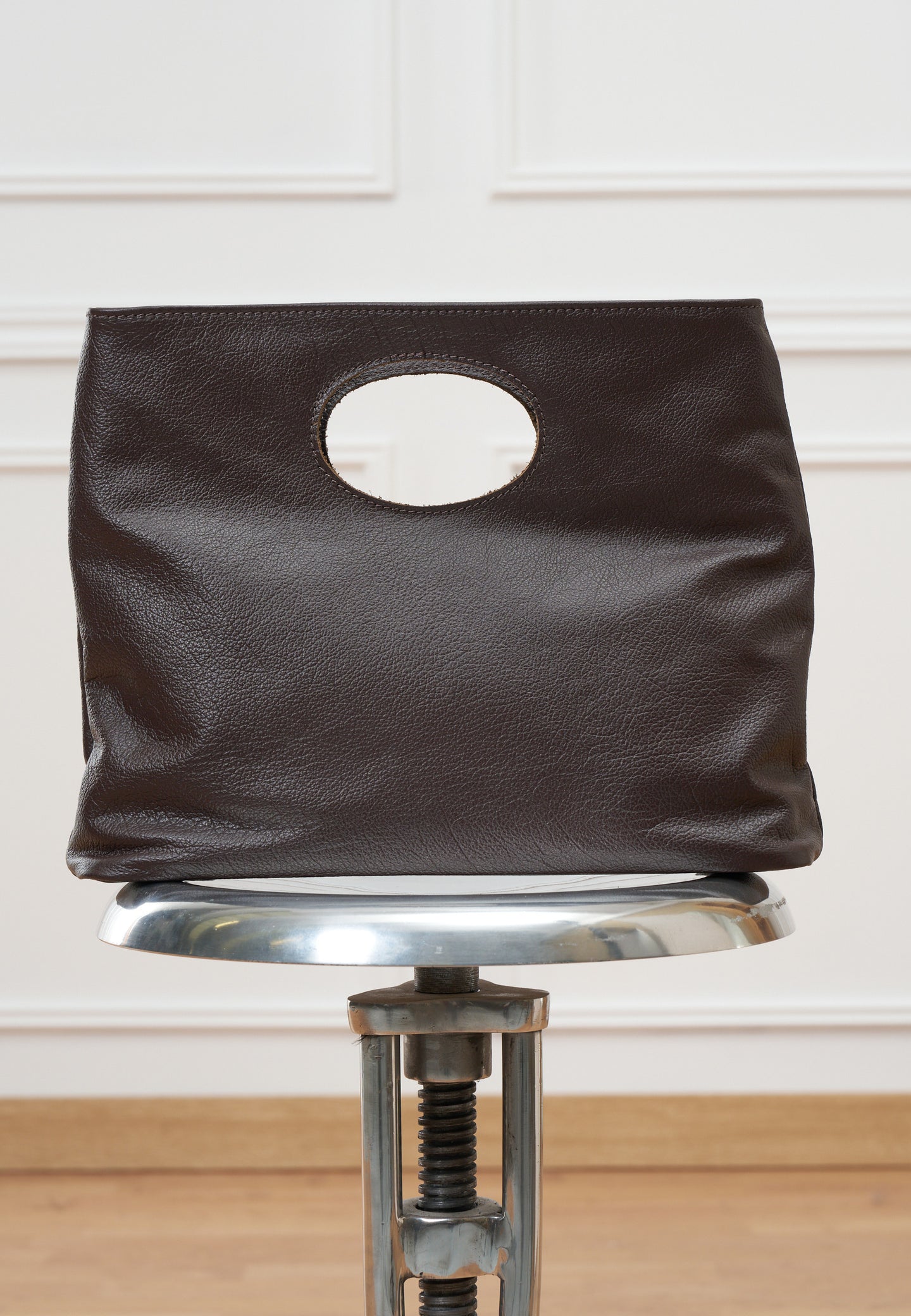 Borsa con oblò in vera pelle