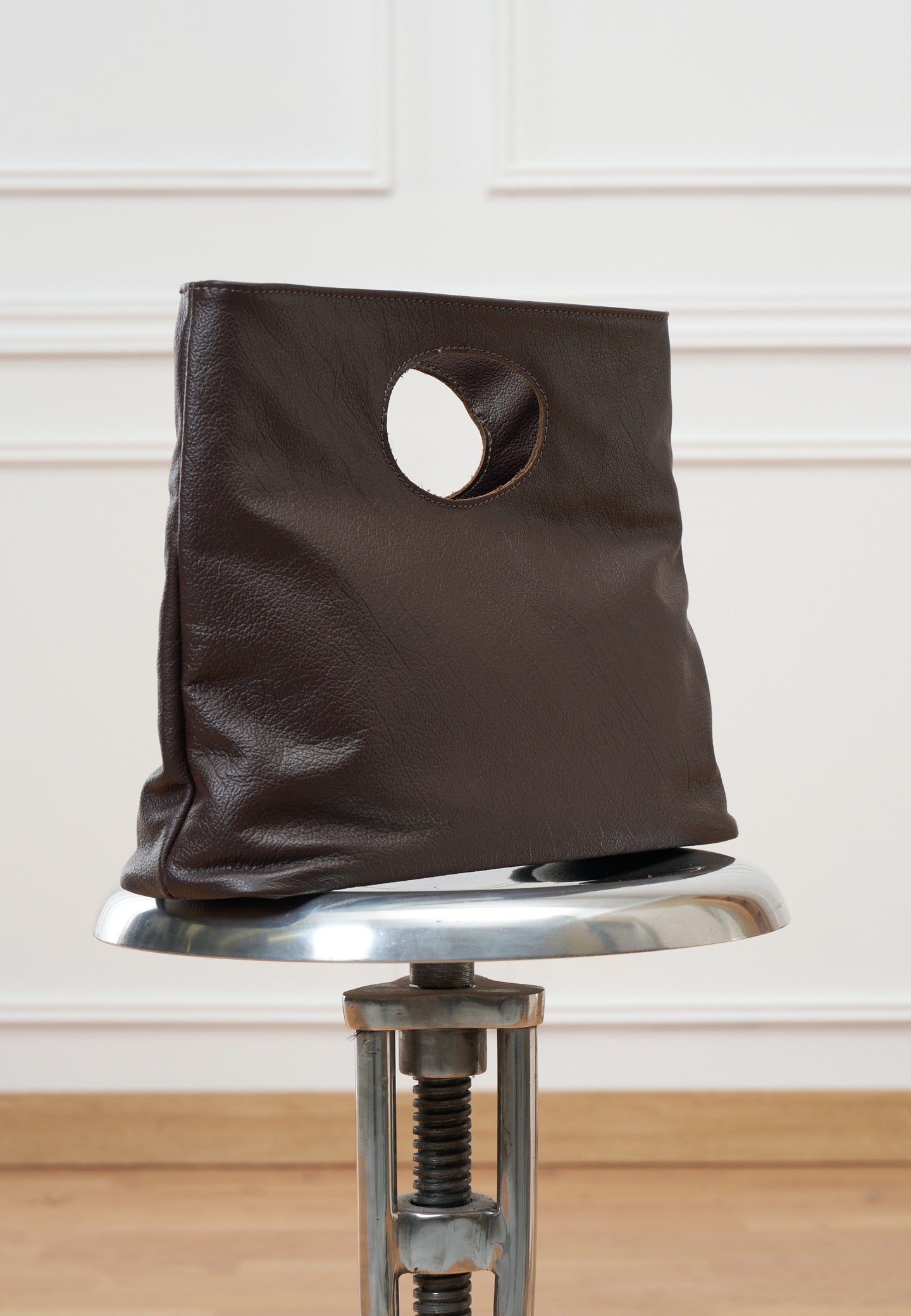 Borsa con oblò in vera pelle