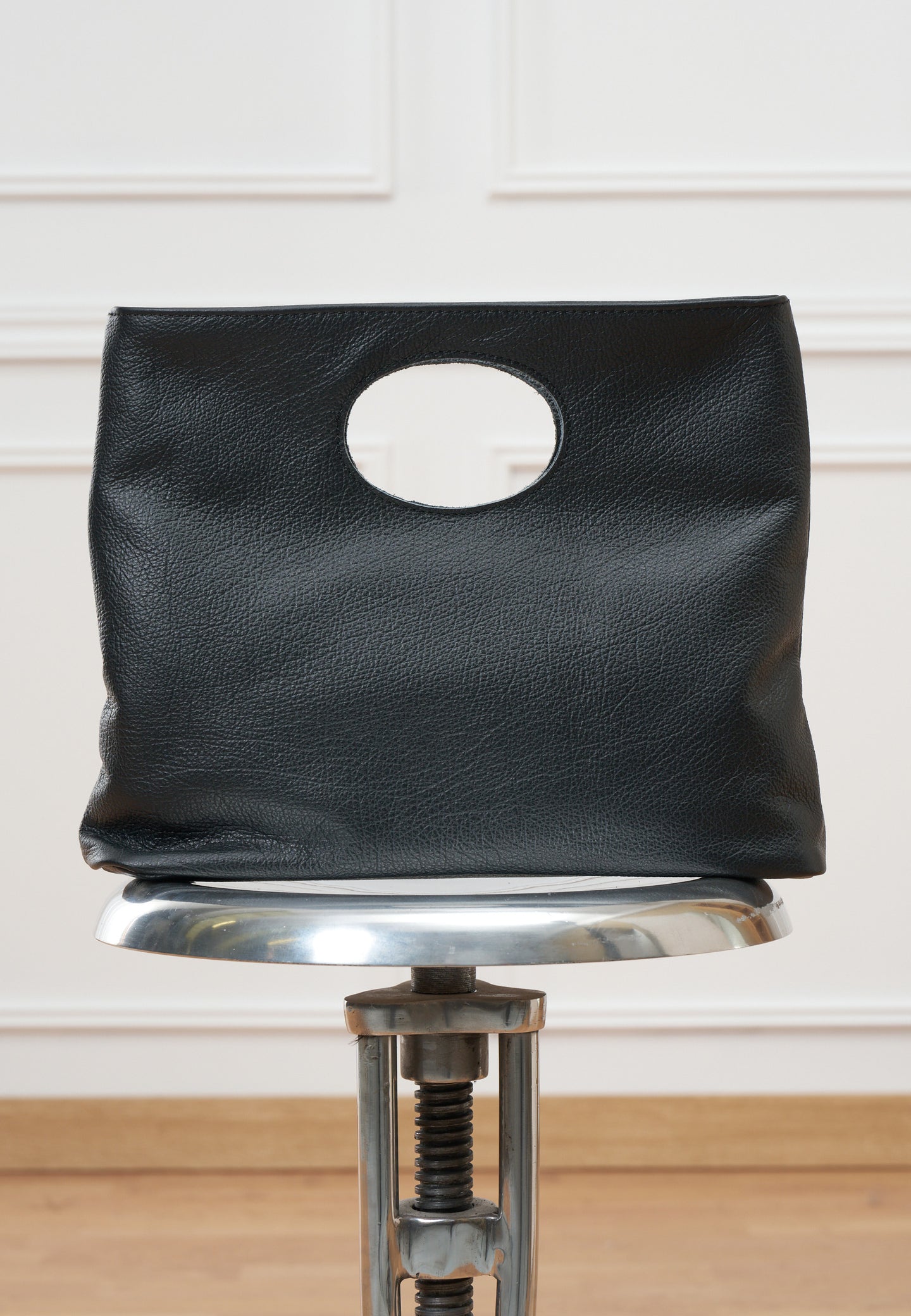 Borsa con oblò in vera pelle