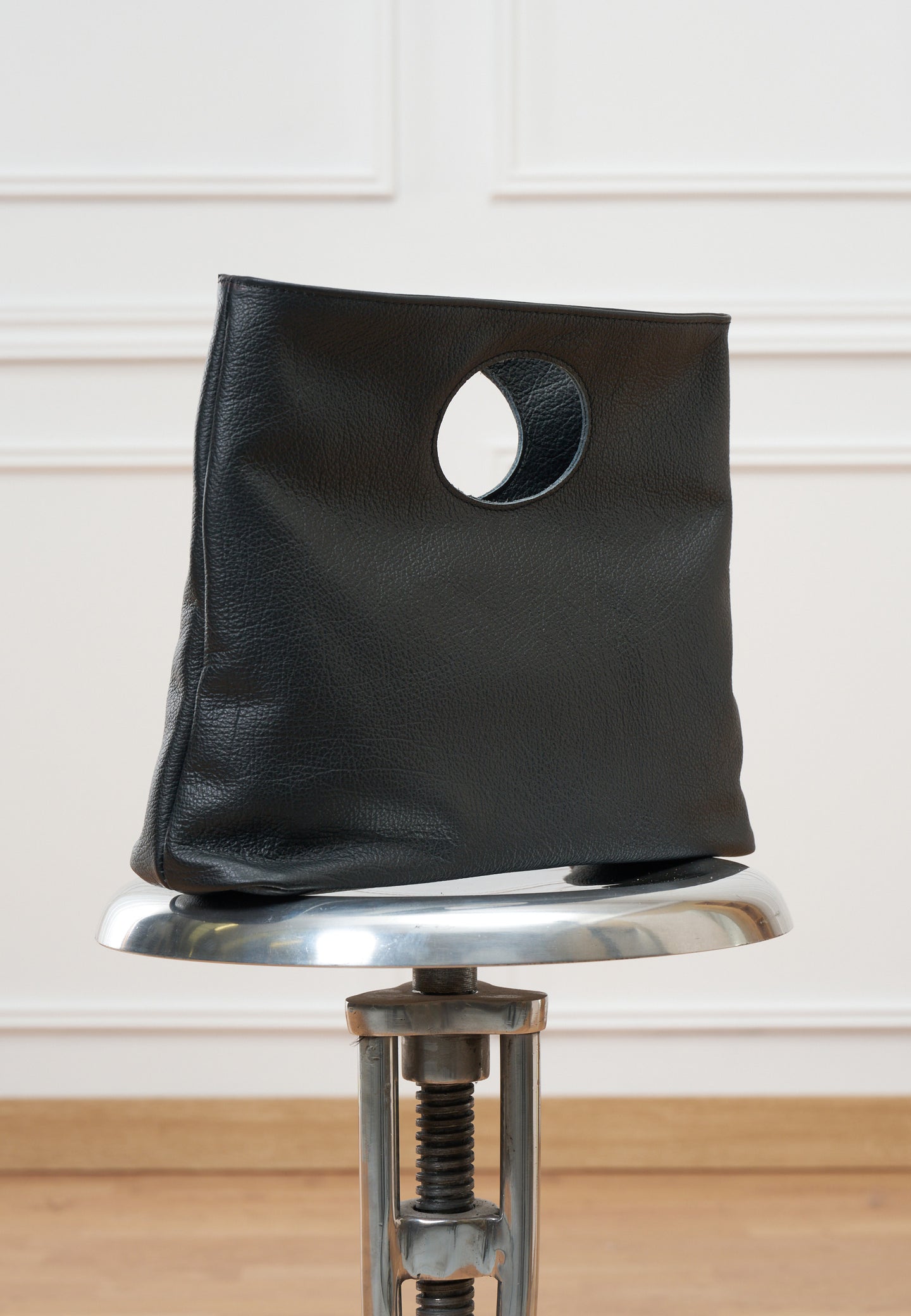 Borsa con oblò in vera pelle