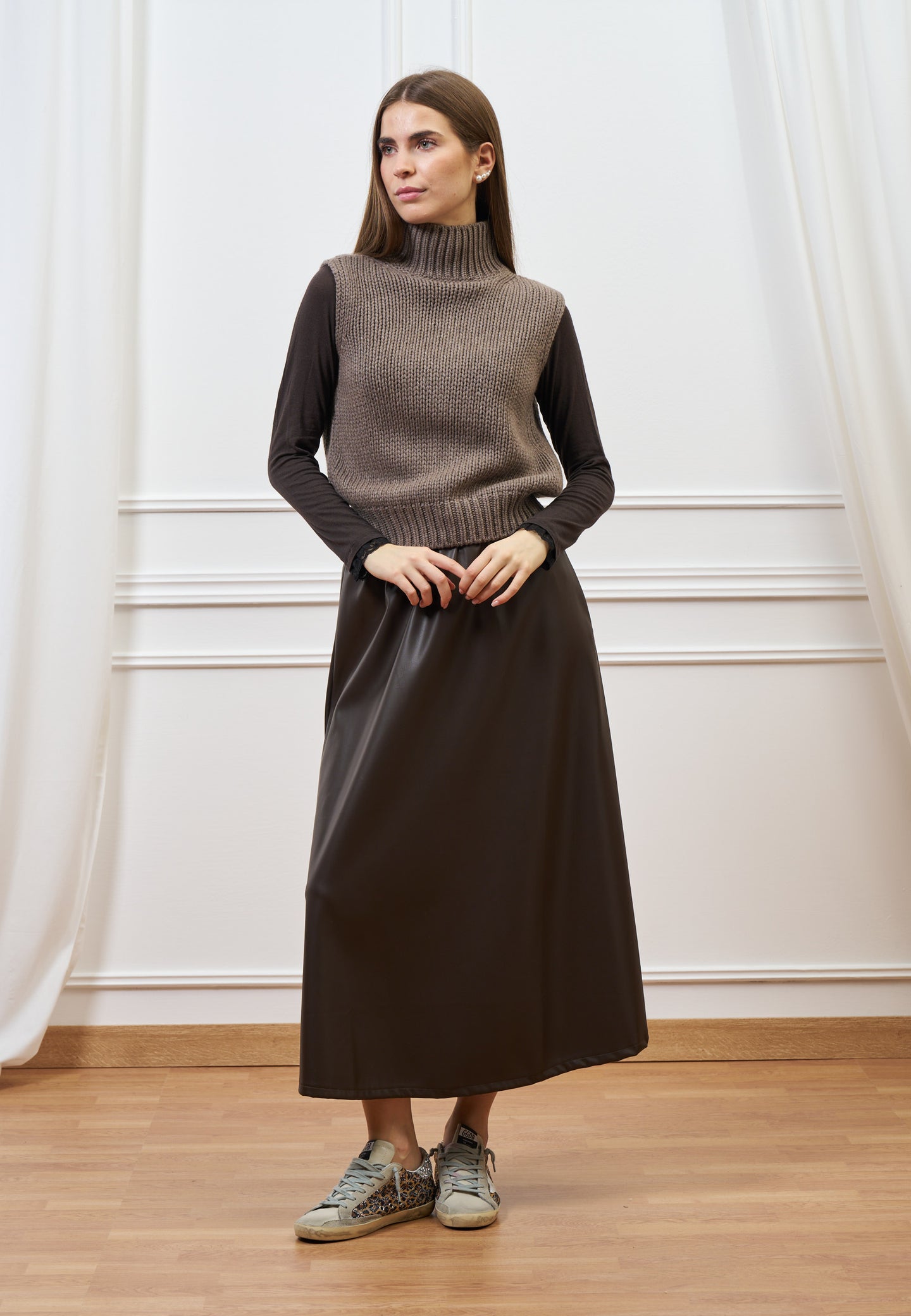 Maglia smanicata apertura sul retro