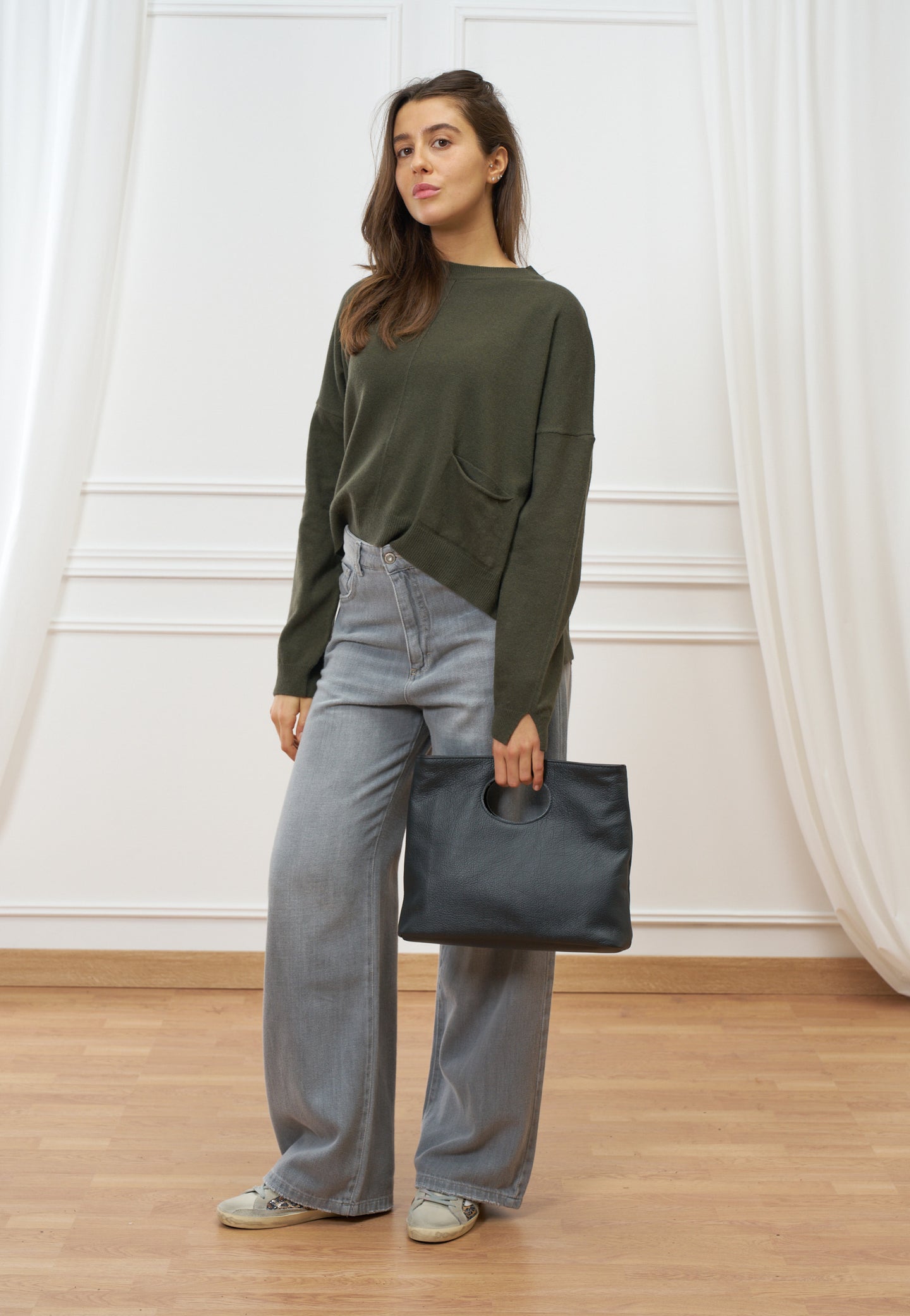 Borsa con oblò in vera pelle