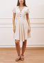 Vestito corto in viscosa con fiore - BEIGE