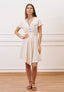 Vestito corto in viscosa con fiore - BEIGE