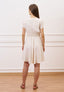 Vestito corto in viscosa con fiore - BEIGE
