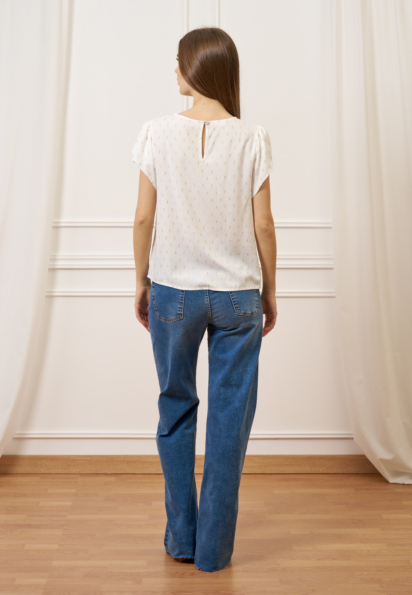 Blusa con maniche a petalo