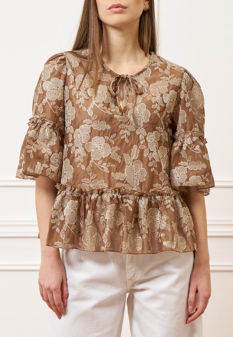 Blusa ricamata con balze