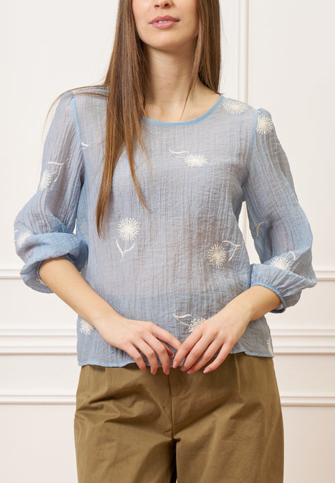 Blusa con fiori piccoli ricamati