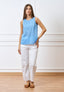 Blusa smanicata con scollo sul retro - CELESTE