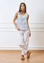 Blusa smanicata a righe con ricami floreali - CELESTE