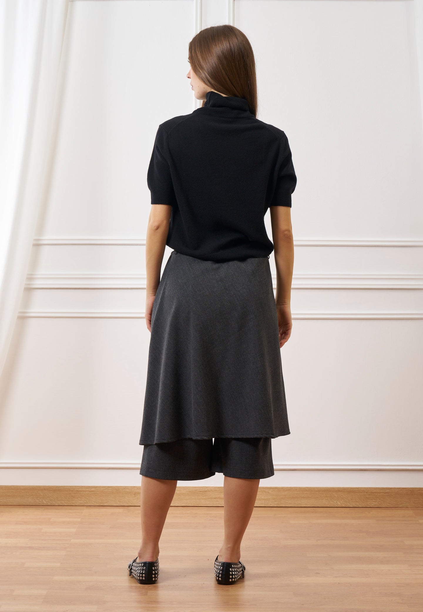 Bermuda con pannello applicato