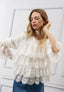 Blusa con balze in pizzo