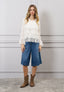 Blusa con balze in pizzo
