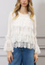 Blusa con balze in pizzo