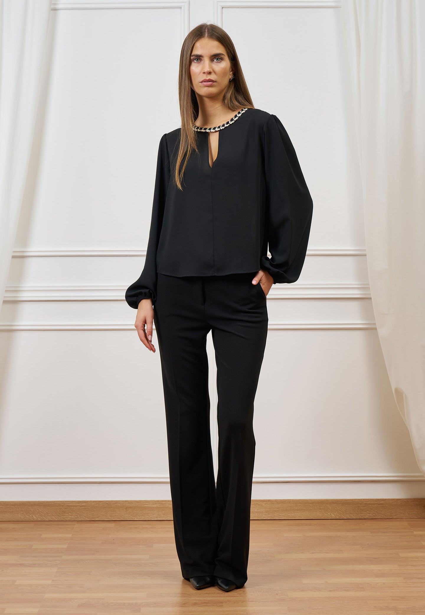 Blusa con scollo a goccia